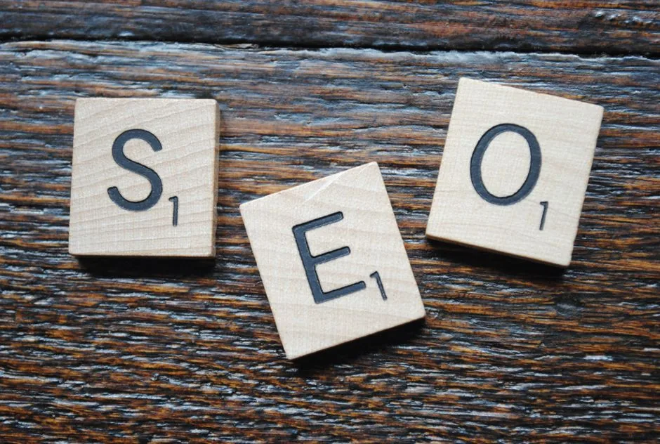 An e-commerce strategist analyzing Amazon search terms optimization metrics on a dashboard to increase product listing visibility for sellers.