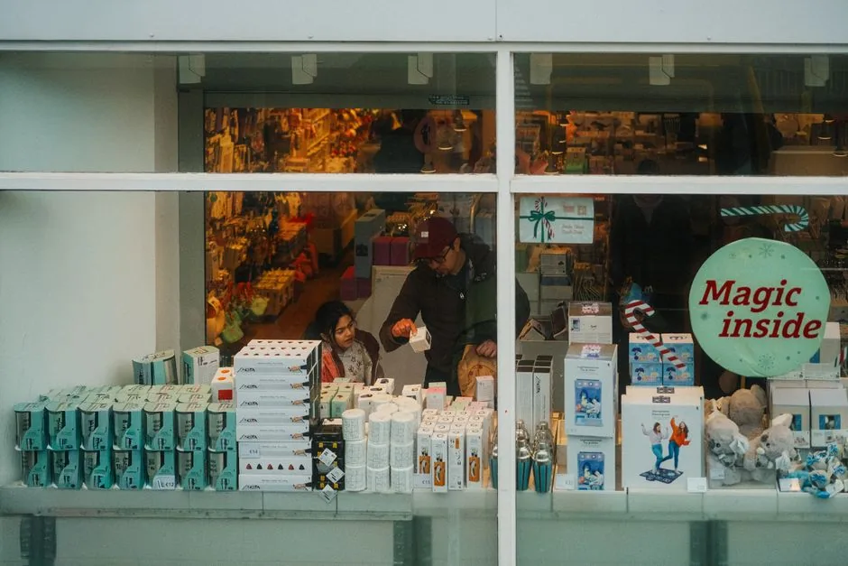 A retail executive analyzing Anthropic AI shopping agents on a tablet to improve e-commerce conversion rates.