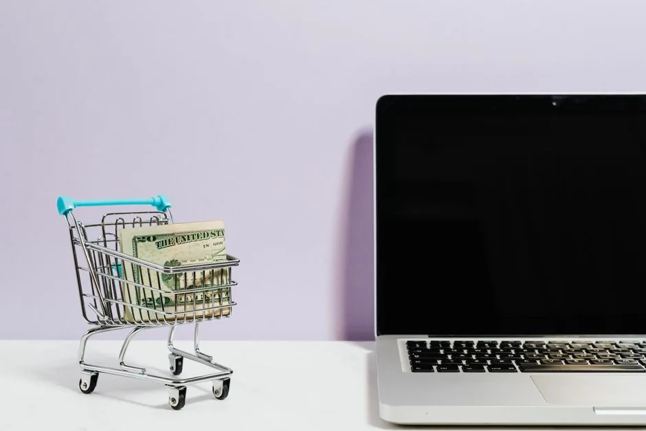 Illustration of a marketer reallocating budget from traditional ads to AI commerce tools, highlighting the shift toward automated shopping assistants for ecommerce brands