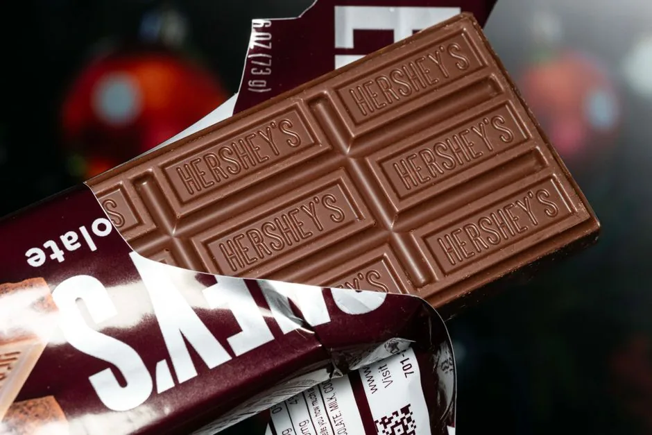 A retail store display being optimized by AI computer vision to maximize Hershey smores sales for retail managers.