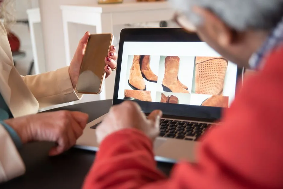 A retail strategist analyzing predictive data on a tablet to optimize ecommerce supply chain management for modern brands.