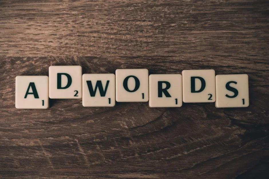 Marketer analyzing keyword clustering data on a dashboard to optimize keywords for Amazon for e-commerce brands.
