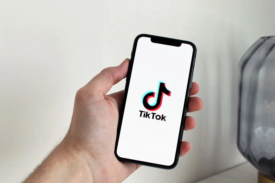 Business manager reviewing TikTok Shop and Amazon dashboards to align inventory and pricing across channels