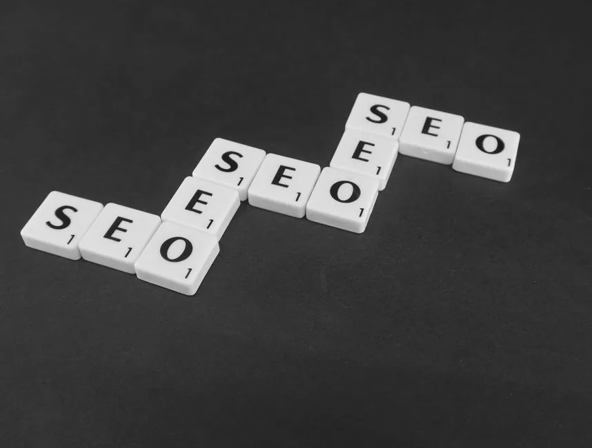 A digital marketer analyzing Amazon backend search terms on a laptop to optimize product listing SEO for e-commerce brands.