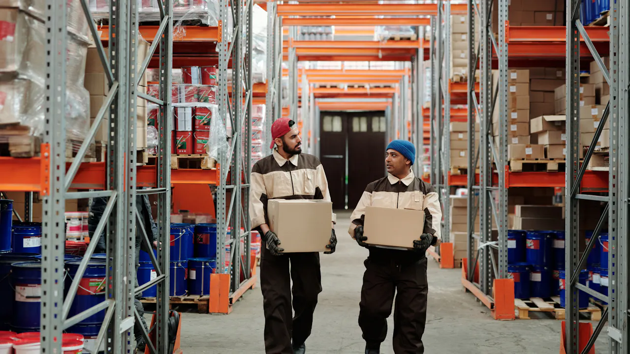 Warehouse team organising product boxes for ecommerce fulfillment — AI automation readiness for online retailers