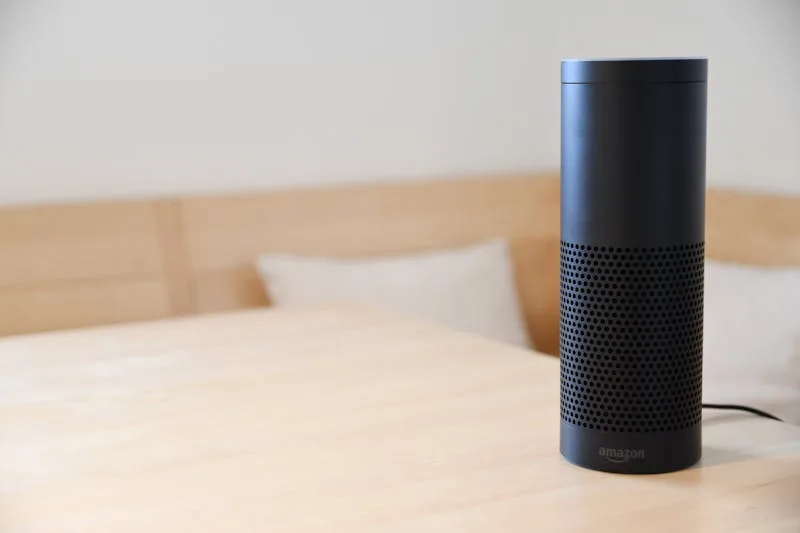 Amazon Echo device on table — Alexa for Shopping AI agent replaces Rufus for brands