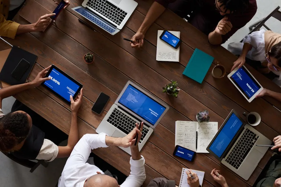 Enterprise team reviewing AI deployment strategy in a collaborative meeting — forward deployed engineers bridging the gap between AI labs and production