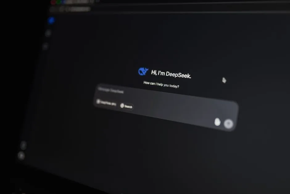 A customer interacting with Newegg's conversational AI shopping assistant on a laptop to find compatible PC parts.